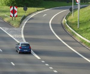 A car on a highway.