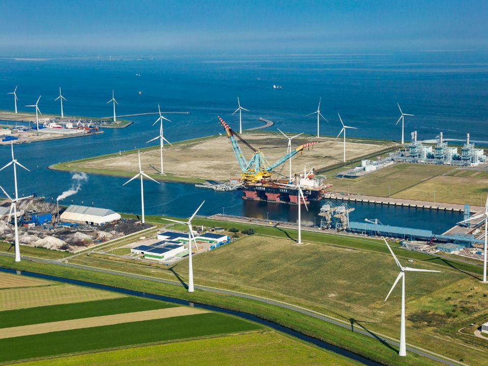 Wind turbines in a port area.