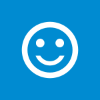 Een wit icoon met een lachende smiley en een blauwe achtergrond.